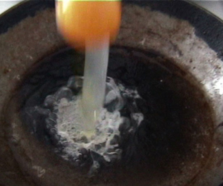 Film stills from artist Emilia Izquierdo's experimental film Eggs 2006.